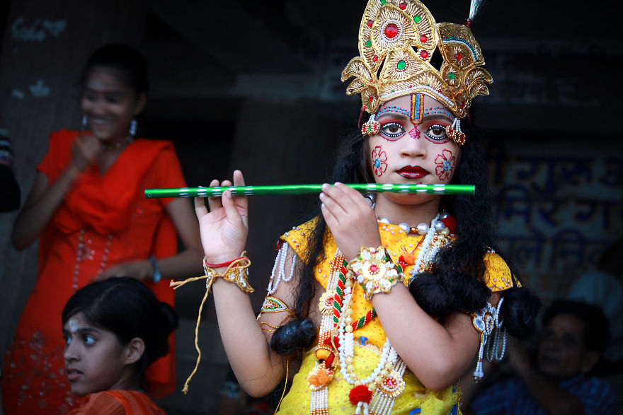 A Boy Dressed Up In Krishna. Varanasi, India