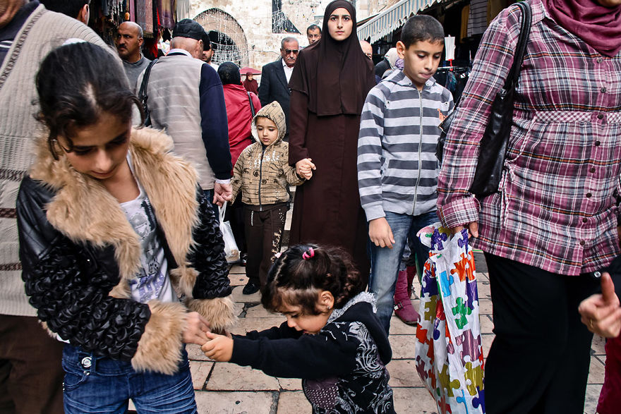 A Mother In The Crowd At The Damascus Gate, Jerusalem