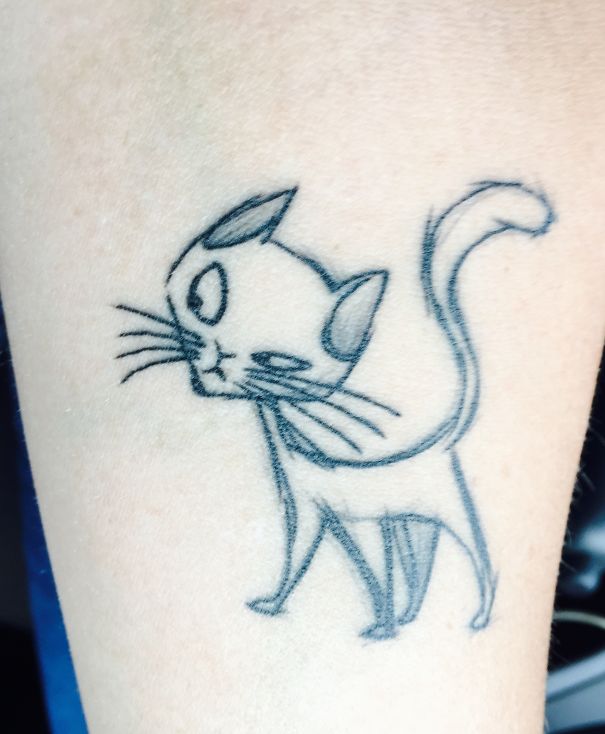 Simple outline cat tattoo on forearm, perfect for cat person expression.