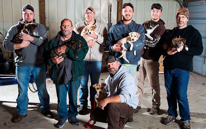 Stray Dog Leads Partying Bachelor Guys To Her 7 Newborns, They Adopt Them All