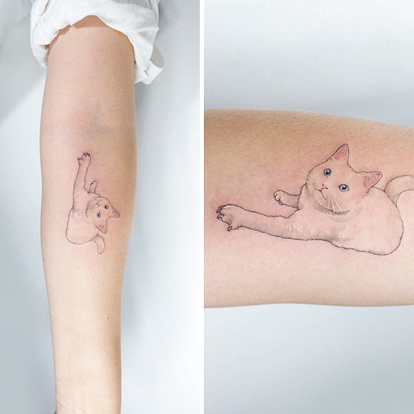 Close-up of a delicate cat tattoo on an arm, showcasing a playful feline design for cat lovers.