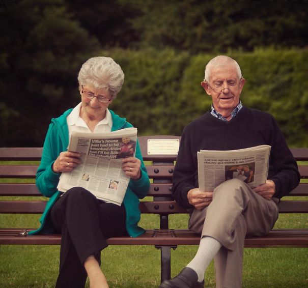 Reading Newspapers In The Park