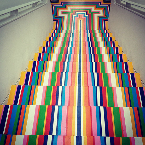Colorful striped stairs, perfectly aligned, satisfy perfectionist’s soul with vibrant symmetry and neat arrangement.