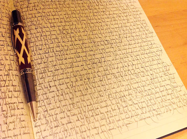 Neatly handwritten notebook with a decorative pen, satisfying every perfectionist's soul.