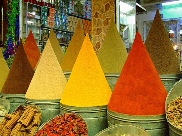 Colorful spice cones neatly arranged, satisfying every perfectionist's soul.