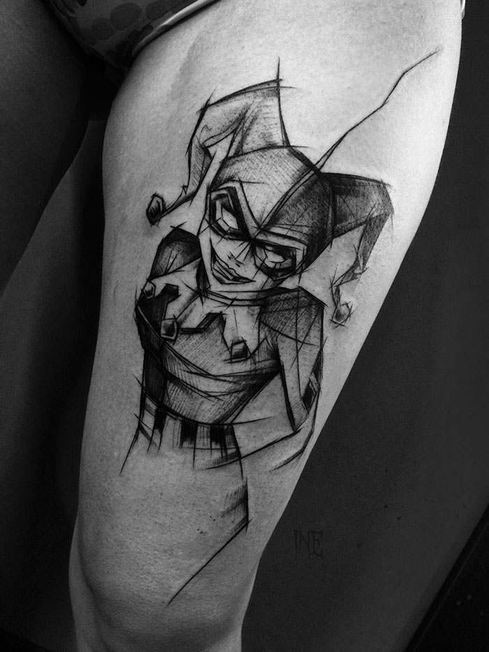Sketch tattoo of a jester character on a thigh, showcasing the beauty of imperfection by a Polish tattoo artist.