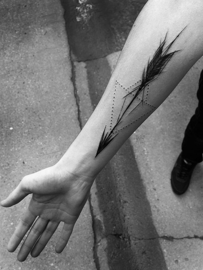 Sketch tattoo on forearm by Polish tattoo artist, showcasing artistic beauty with black ink design.