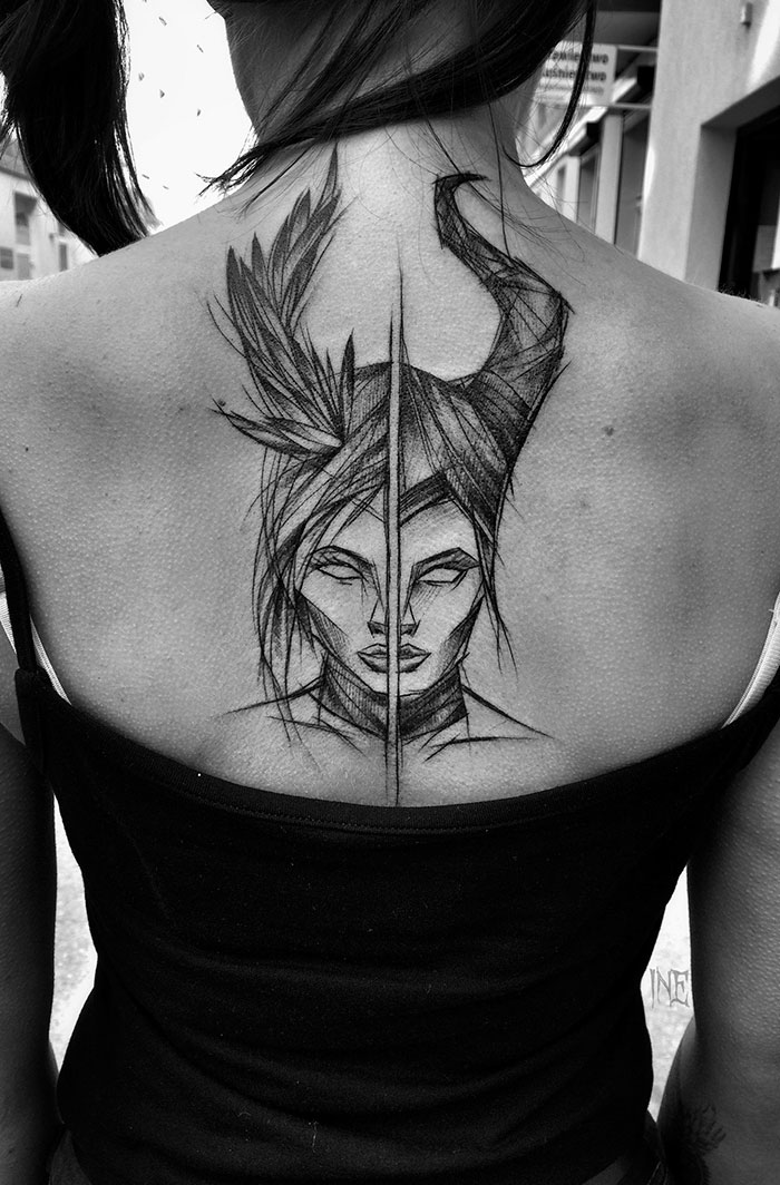 Sketch tattoo by Polish artist showcasing beauty of imperfection on a woman's back.