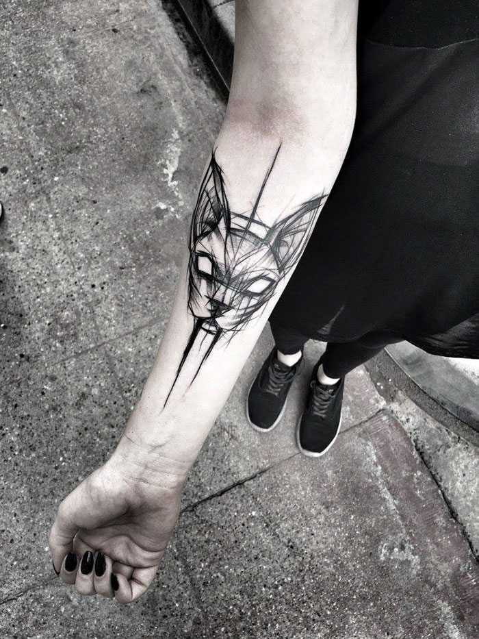 Sketch tattoo of a fox on forearm, showing the beauty of imperfection in Polish tattoo artistry.