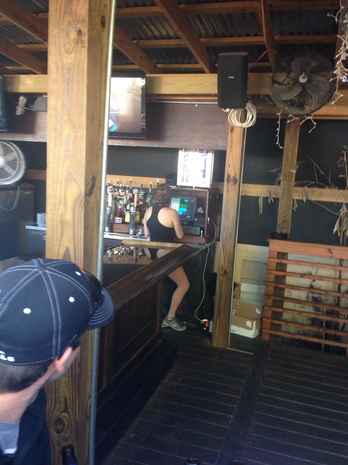 The Reflection Of This Bartender Is A Little Too Perfect