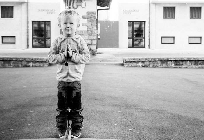 Is It A Reflection Or Just A Boy Standing In The Street?