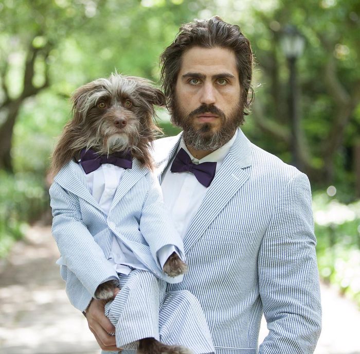 Dog And Human Dressed In Matching Outfits