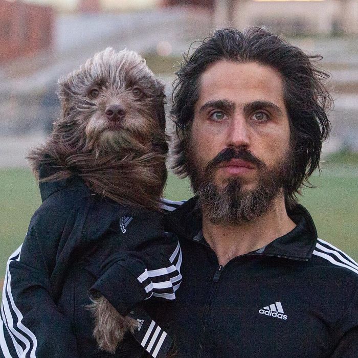 Dog And Human Dressed In Matching Outfits