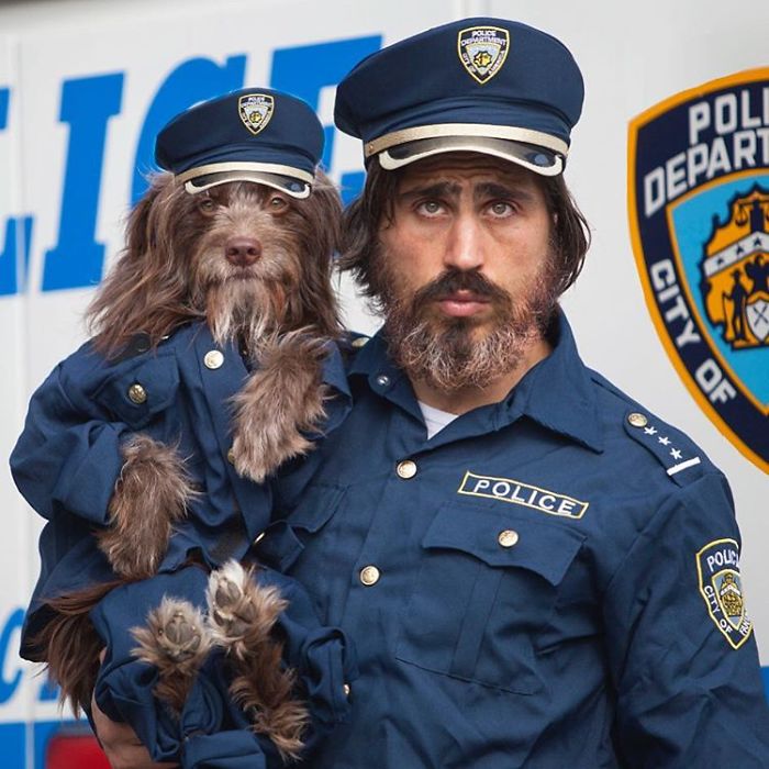 Dog And Human Dressed In Matching Outfits