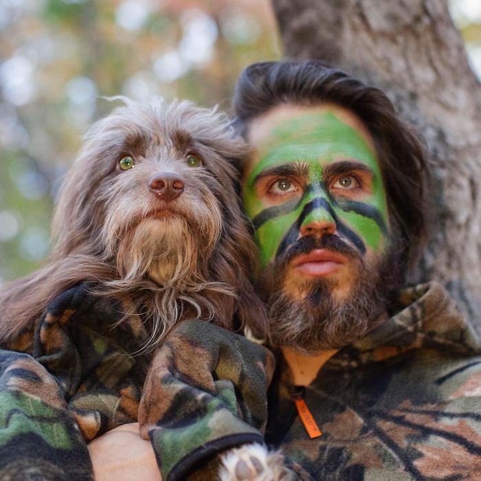 Dog And Human Dressed In Matching Outfits