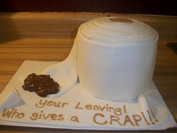 Farewell cake shaped like toilet paper with humorous message, perfect for a hilarious office send-off.