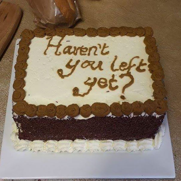 Farewell cake with "Haven't you left yet?" message in icing.