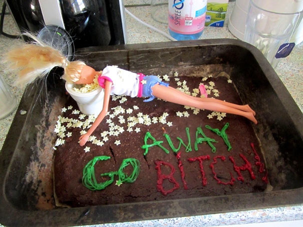 Funny farewell cake with a doll and humorous message for a coworker's last day at the office.