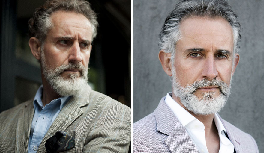 Older man with a stylish gray beard in a plaid blazer and blue shirt, showcasing handsome elegance.