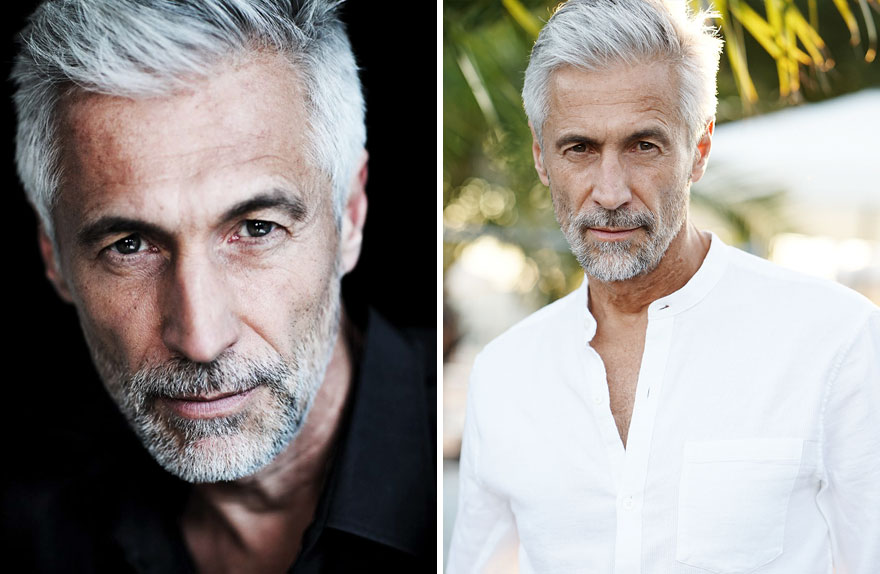 Handsome older man with gray hair and beard, wearing dark and white shirts, redefining the concept of aging.