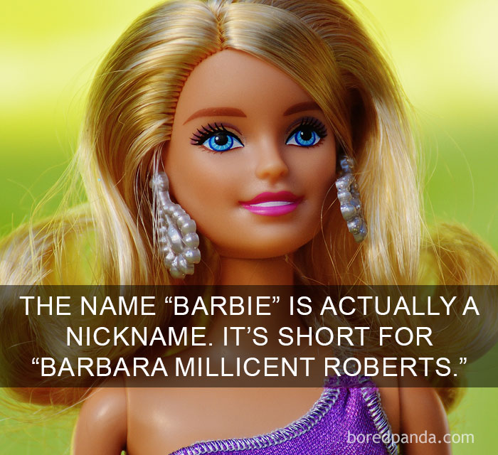 Close-up of a Barbie doll with blonde hair and blue eyes sharing an amazing fact about the world.