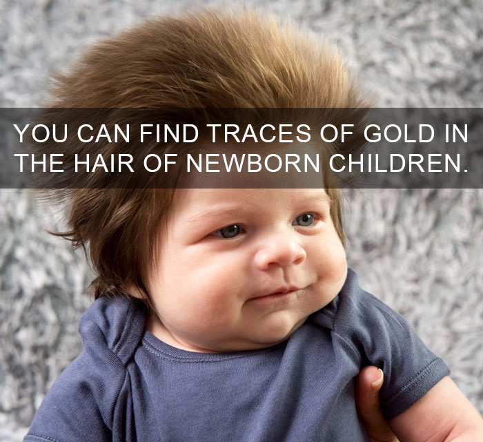 Newborn baby with thick hair illustrating amazing facts about traces of gold in hair and how they change the world.