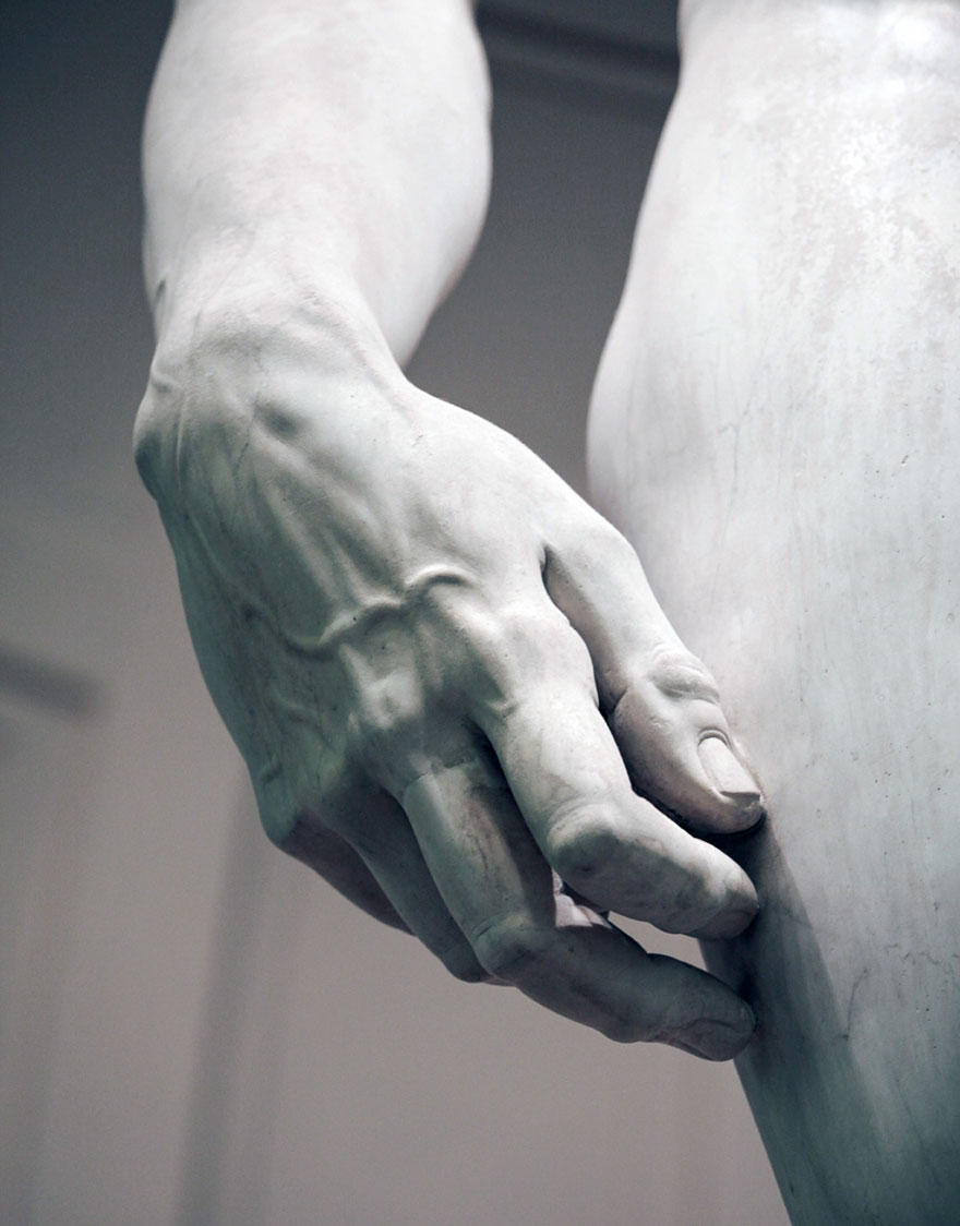 Close-up photography of Michelangelo’s David hand. Close-up photography of Michelangelo’s David hand.