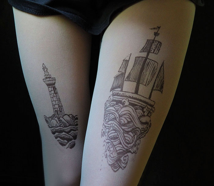 Tattoo tights with ship and lighthouse design creating the illusion of inked legs.
