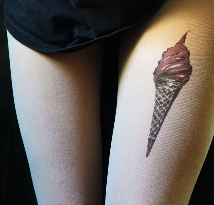 Tattoo tights with ice cream cone design creating an inked illusion on legs.