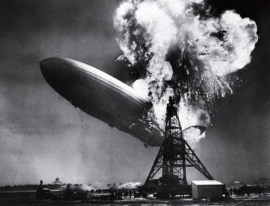 Hindenburg disaster photo capturing the dramatic moment of the airship exploding in mid-air.