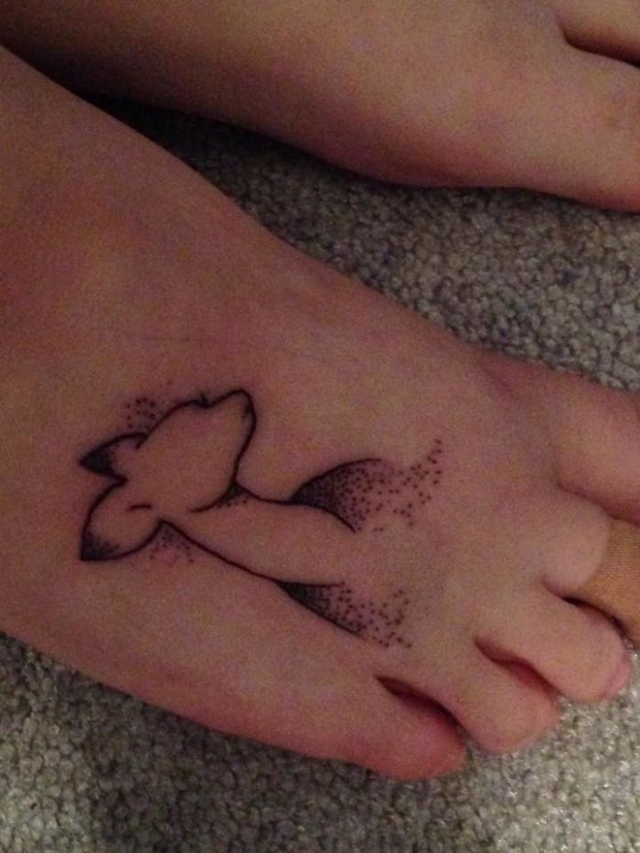 Subtle Harry Potter tattoo of a doe Patronus on a foot, with dot shading technique.