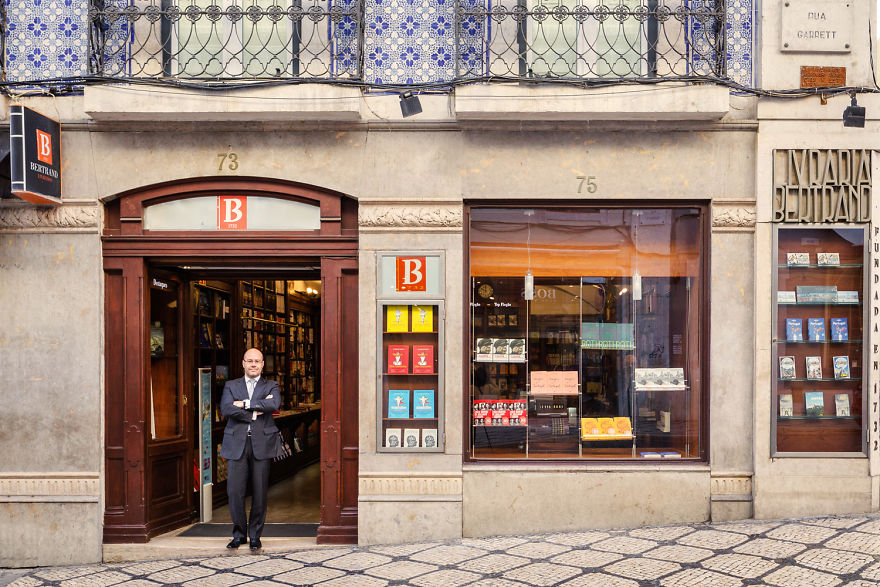 Bookseller Paulo Oliveira At The Door Of The Global Landmark
