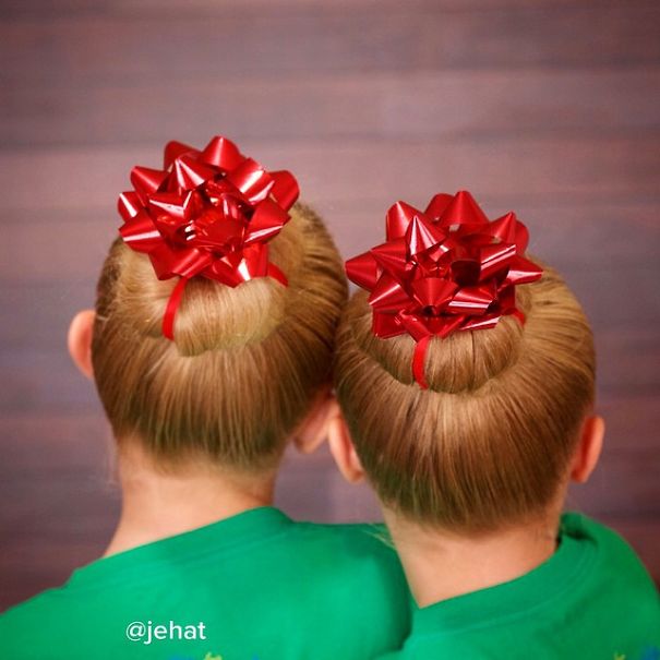 Creative Christmas hairstyles featuring two buns adorned with red ribbon bows.