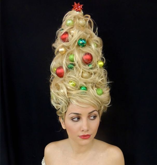 Creative Christmas hairstyle resembling a decorated tree with ornaments on blonde hair.