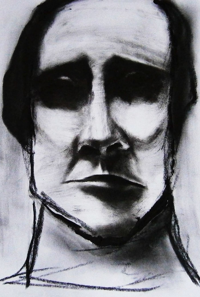 Charcoal drawing of a somber face, illustrating artists' interpretations of depression with deep shadows and stark lines.