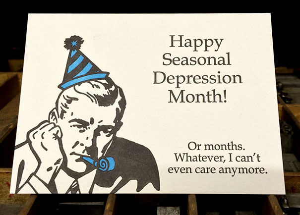 Rude Christmas card with party hat and humorous text about seasonal depression.