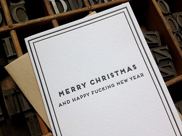 Rude Christmas card with bold text wishing a Merry Christmas and a Happy New Year in a humorous, twisted style.
