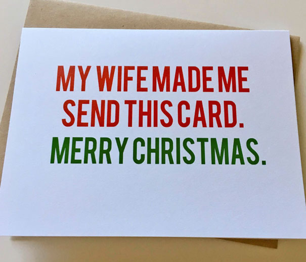 Rude Christmas card with text, "My wife made me send this card. Merry Christmas," in red and green letters.
