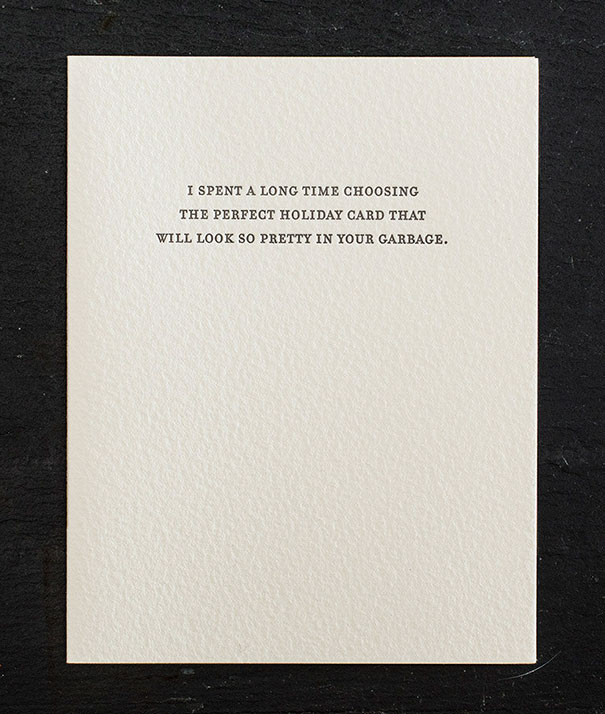 Rude Christmas card with sarcastic message about holiday cards ending up in the trash.
