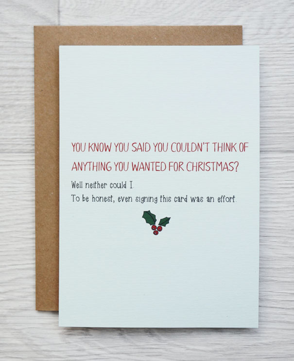 Rude Christmas card with a humorous message about lack of gift ideas, featuring holly decoration.