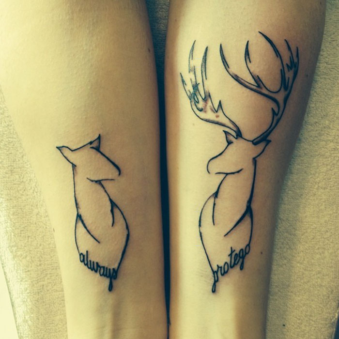 Subtle Harry Potter tattoos of a doe with "always" and a stag with "protego" on forearms.