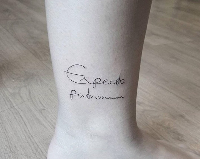 Subtle Harry Potter tattoo on ankle with "Expecto Patronum" in script.