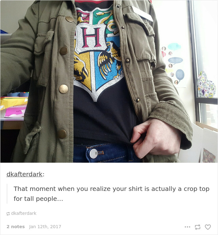 Person wearing a Hogwarts shirt, emphasizing short people problems with clothing length.