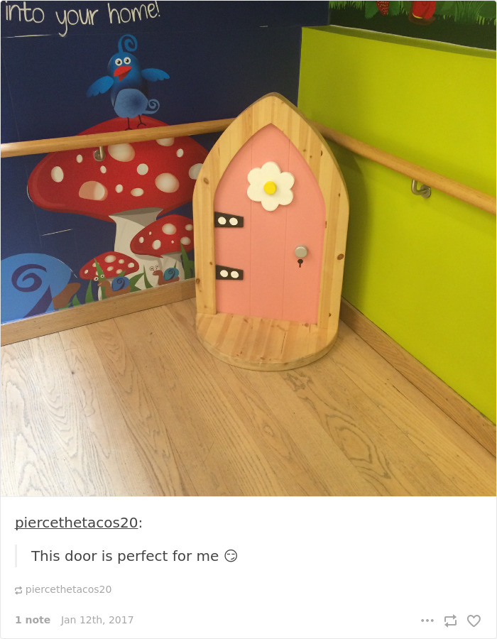 Small pink door in a colorful room, perfect for highlighting short people problems related to reaching high places.