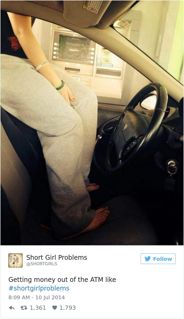 Short person using car seat to reach ATM, illustrating common short people problems and humorous challenges.