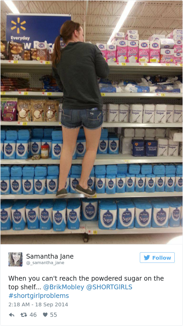 Person standing on lower shelf in store reaching for sugar on top shelf, illustrating short people problems.