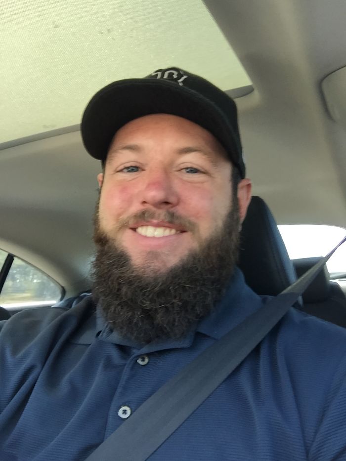 Man taking a selfie in a car 