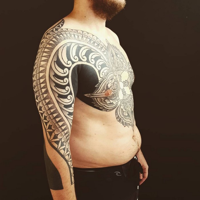 Brazilian tribal arm tattoo design by artist Brian Gomes, inspired by Amazonian art.