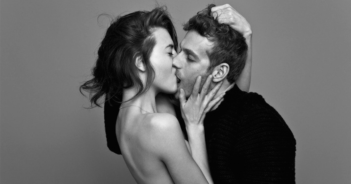 When photographer Ben Lamberty took a random picture of a couple kissing in...