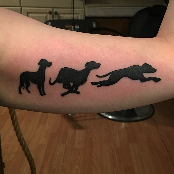 Dog tattoo showing progression of dog silhouette from standing to running.